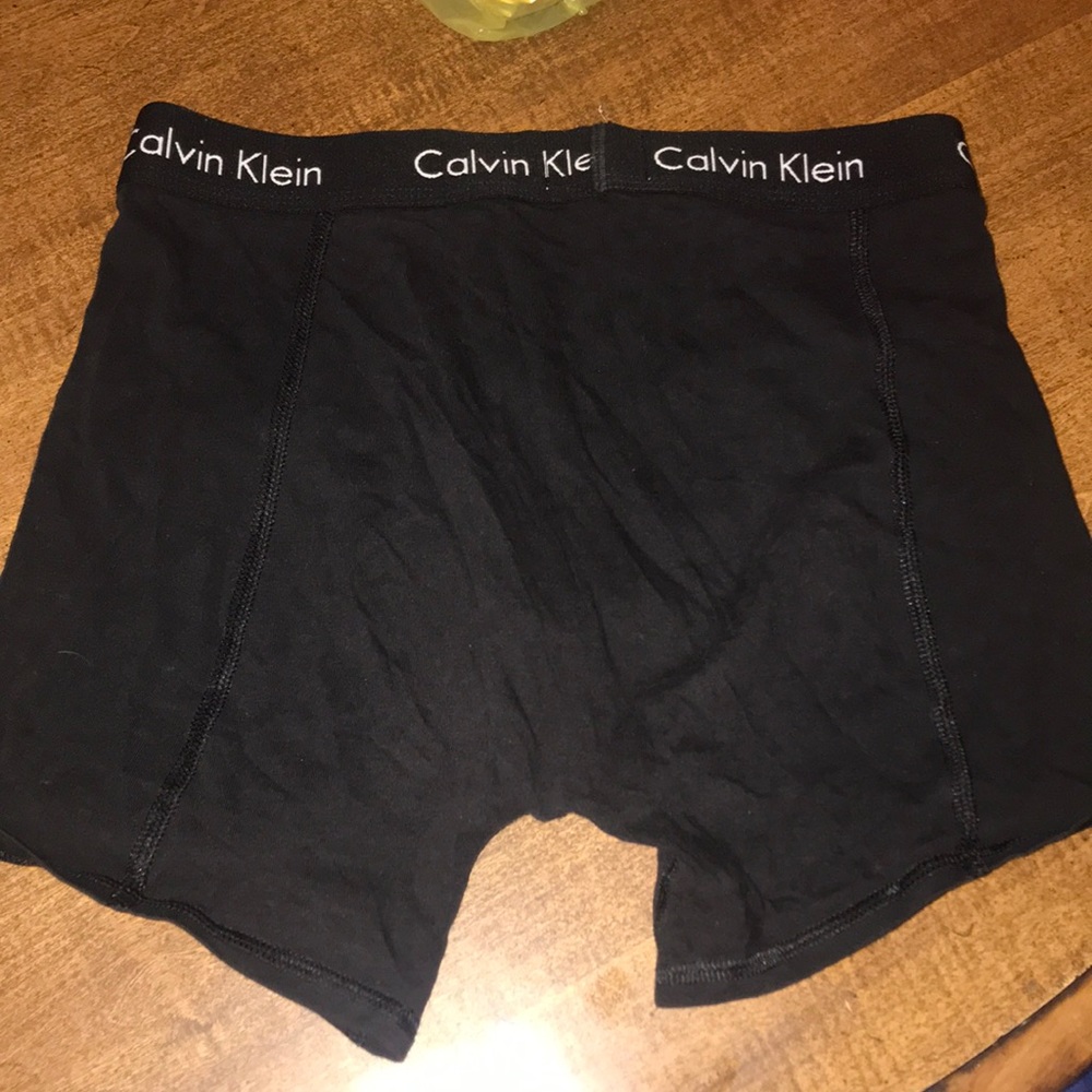 Two pairs men Calvin Klein small underwear